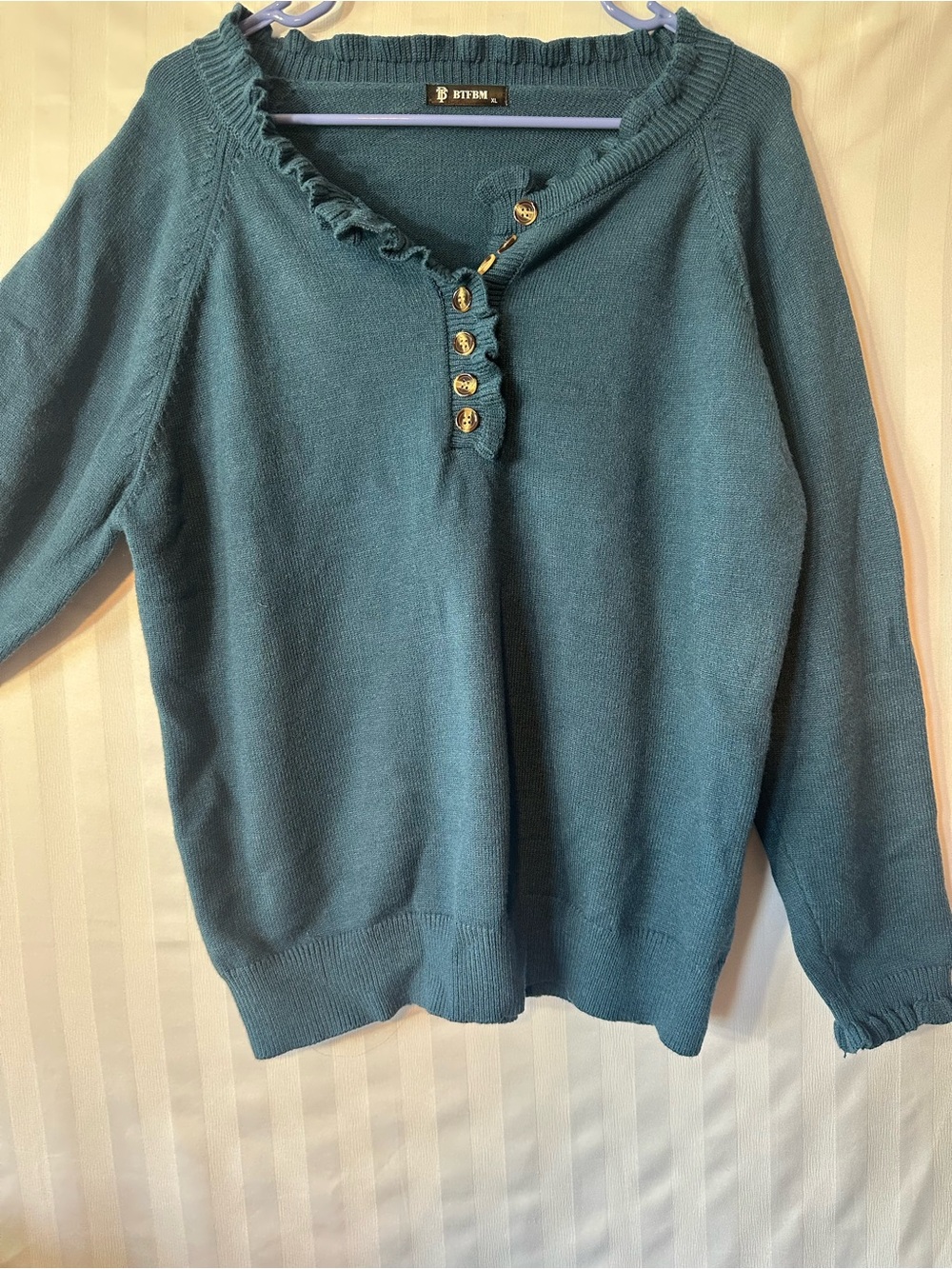 BITTEN Teal Ruffled Henley Turtleneck Sweater